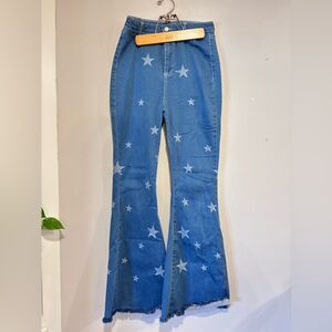 Nasty Gal Written in the Stars wide-leg flare light wash denim printed raw hem